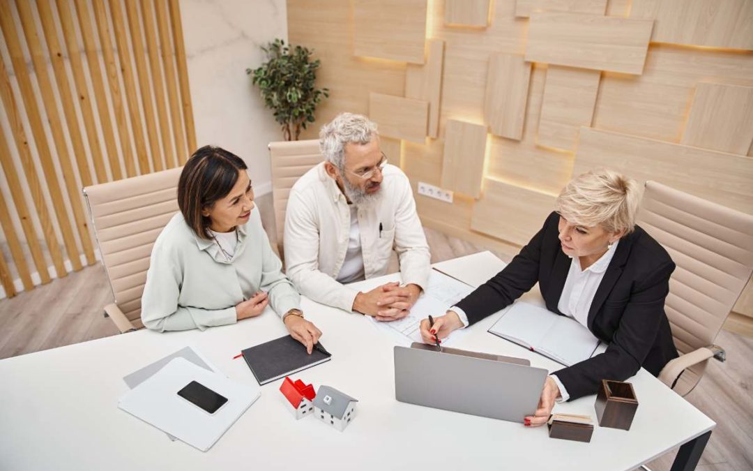A family meeting with a professional estate planner to discuss legal documents for wills and trusts, emphasizing collaboration and careful estate planning decisions.